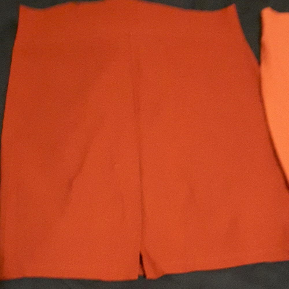 Three mini pencil skirts